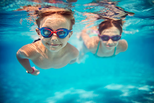 kids swimming in pool